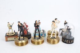 Eleven Elvis Presley music boxes, to include three modelled as Elvis standing on record players,