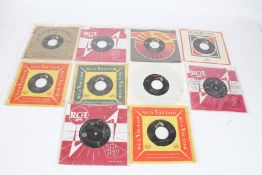 A collection of approx. 10 Elvis Presley USA singles