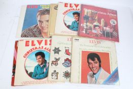 A collection of approx. 10 Elvis Presley Christmas LPs to include Elvis' Christmas Album ( PL85486 )