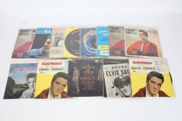 A collection of approx. 9 Elvis Presley orange label reissue EPs and 4 various Elvis 45s