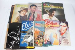 A collection of approx. 10 Elvis Presley LPs to include Roustabout ( RD-7678 )