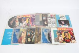 A collection of approx. 19 Elvis Presley 1980s singles