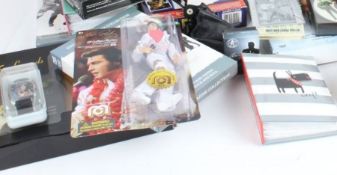 Elvis Presley memorabilia to include coasters, keyrings, figures, playing cards, coins, beer stein