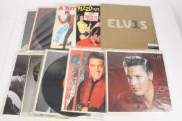 A collection of approx. 10 Elvis Presley LPs to include 30 #1 Hits ( 07863 68079 1 )