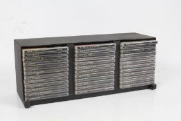 Small rack of Elvis CDs