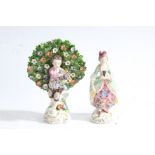 Pair of Sampson Chelsea style figures, one depicting a young child picking flowers with a floral