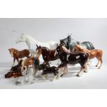 Collection of twelve porcelain horses, to include a large dapple grey Sylvac example and a small