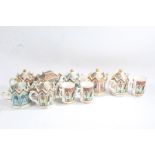 Seven Sadler novelty teapots, all battle related including Waterloo and Agincourt, and three mugs (