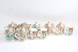 Seven Sadler novelty teapots, all battle related including Waterloo and Agincourt, and three mugs (