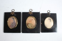 Pair of 19th century hand painted miniatures, depicting a lady and gentleman in profile,