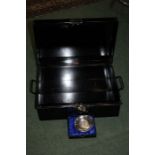 Metal storage case, together with a 300th Anniversary commemorative dish to C. Hoare & Co Bank, in