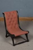Unusual Victorian mahogany X frame chair, with a upholstered button back raised on turned stretchers