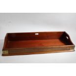 Large mahogany campaign style book carrier, with pierced carrying handles and brass mounted corners,