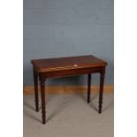 19th century mahogany card table the top opening to reveal a blue baize interior raised on turned