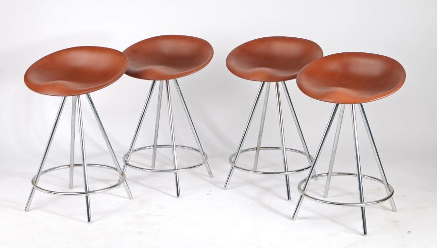 Set of four modernist style stools, with saddle seats and raised on chrome bases (4)