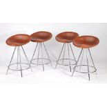 Set of four modernist style stools, with saddle seats and raised on chrome bases (4)