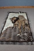 Wall hanging depicting a lion standing on a rock, the wall hanging formed from rabbit skins, 188cm