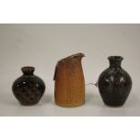 Two Muchelney Pottery squat vases with incised line decoration, 13cm and 9.5cm high, Muchelney