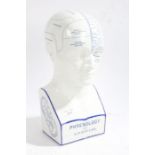 A good Chemist shop white porcelain phrenology head, by L N Fowler, of typical form in blue