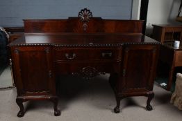 Large early 20th century mahogany sideboard, having gallery back with scallop motif, above an