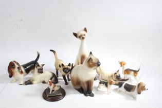 Collection of ceramic figures, to include Siamese cats, Coopercraft dogs etc., (qty)