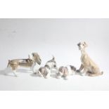 Four Lladro porcelain dogs, the tallest 19.5cm tall (4)
