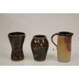 Two Muchelney Pottery vases with geometric wax resist decoration, 17cm and 15.5cm high, Muchelney