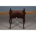 Late Victorian piano stool, with hinged lift up seat and raised on cabriole legs