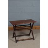 Unusual 20th century mahogany bobbin turned table, having a rectangular top above bobbin turned X