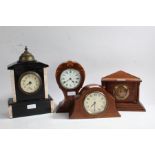 Four various mantle clocks, top include and Edwardian balloon shaped example, a late Victorian black