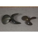 Two brass boat propellers, 50cm wide & 40cm wide (stamped 1714) (2)