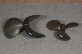 Two brass boat propellers, 50cm wide & 40cm wide (stamped 1714) (2)
