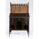 Attributed to Liberty & Co. Arts and Crafts 'Medina' bureau bookcase of Moorish style, after a