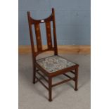 Arts and Crafts mahogany and boxwood inlaid nursing chair, early 20th century, having curved rail
