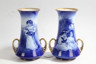 Pair Royal Doulton porcelain vases, blue and white transfer printed scenes of children picking