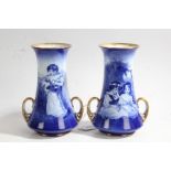 Pair Royal Doulton porcelain vases, blue and white transfer printed scenes of children picking
