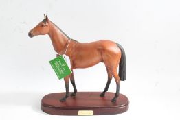 Royal Doulton model 'Red Rum', on wooden base, boxed, 30cm long