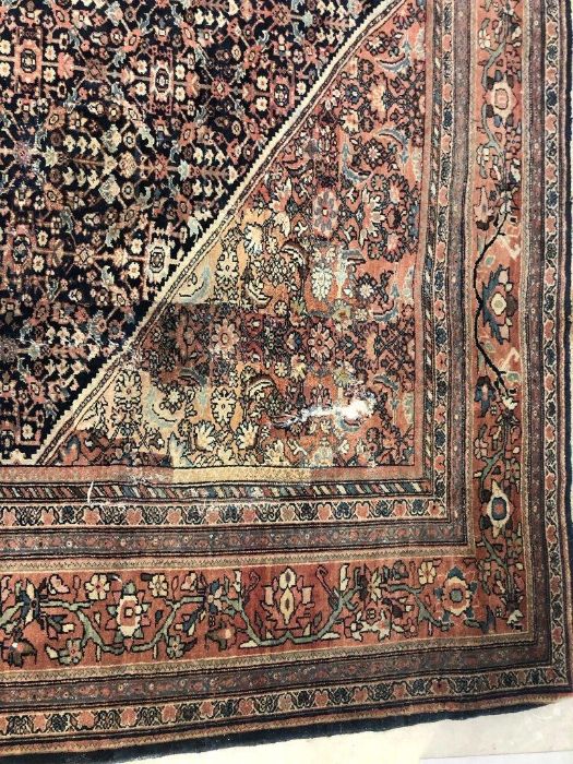 An Isphahan carpet, central terracotta medallion on blue field, terracotta spandrels, with all- - Image 2 of 3