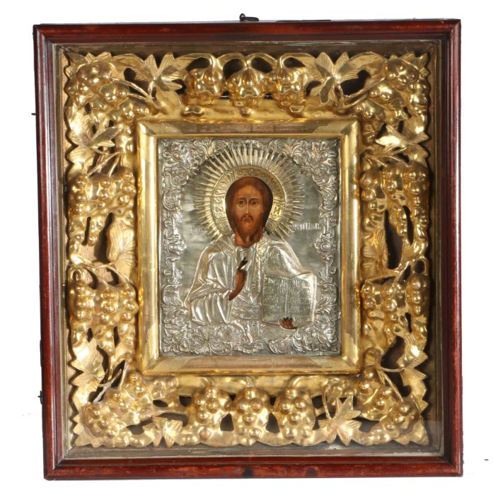 Large 19th Century Russian icon, with depiction of Jesus Christ, housed in a pierced gilt fruiting