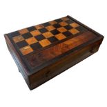 A large 19th century rosewood and inlaid folding chess/backgammon board, together with fifteen ebony