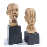 Two 19th Century carved heads, possible Lay figure heads/ doll heads, with flaked paint above