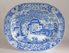 A rare early 19th blue & white transfer printed platter, Eastern town scene with figures,