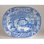A rare early 19th blue & white transfer printed platter, Eastern town scene with figures,