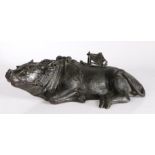 Large 19th Century Chinese bronze ox, modelled in a laying position with saddle covering a small