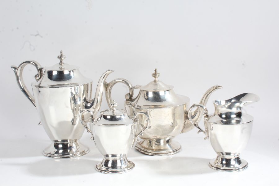 A 20th century Mexican silver four-piece tea set, stamped 925 Sterling, comprising teapot, hot water