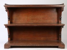 Victorian oak three tier buffet, in the Gothic manner, the gallery top above three rectangular