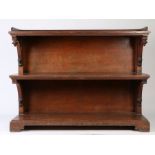 Victorian oak three tier buffet, in the Gothic manner, the gallery top above three rectangular
