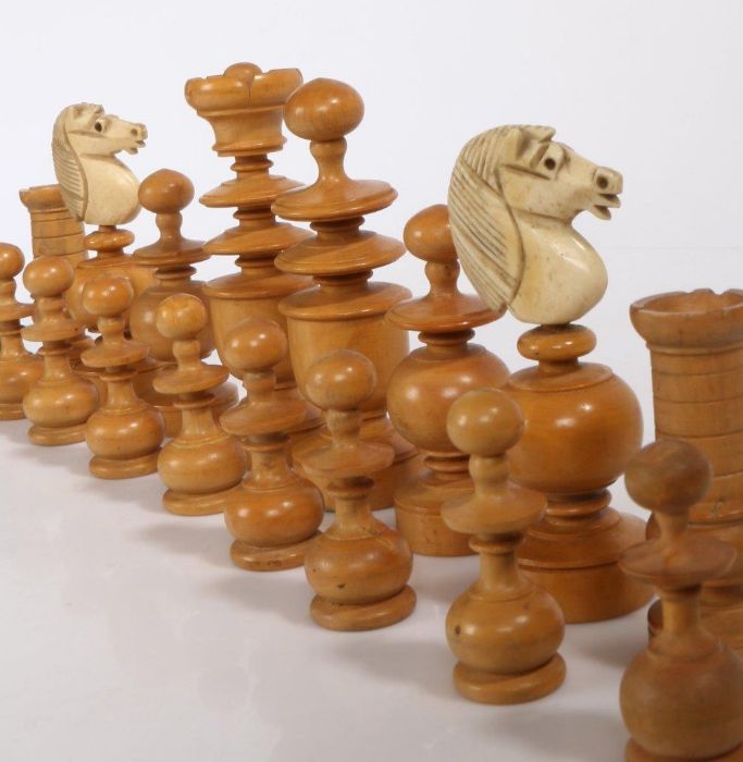 A Regence pattern chess set, French late 19th century, turned boxwood and ebony pieces with carved - Image 2 of 2