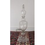 A rare glass Chemists pasteur filter, of large proportions, with a finial top above three shaped