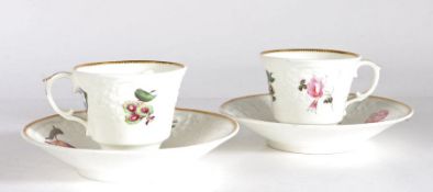 Pair of early 19th Century John Rose Coalport cups and saucers, the white cups and saucers with gilt